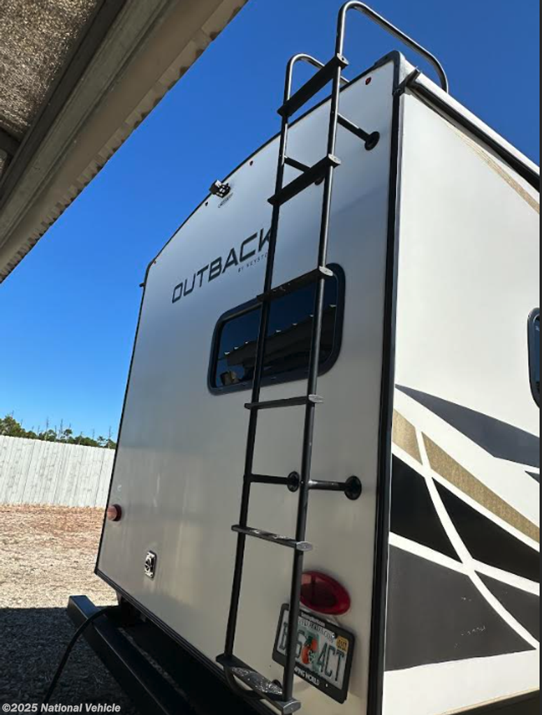 Call now about this 2022 Keystone Outback 332ML! 2022 Keystone Outback 332ML - Used Travel Trailer For Sale by National Vehicle in Santa Rosa Beach, Florida