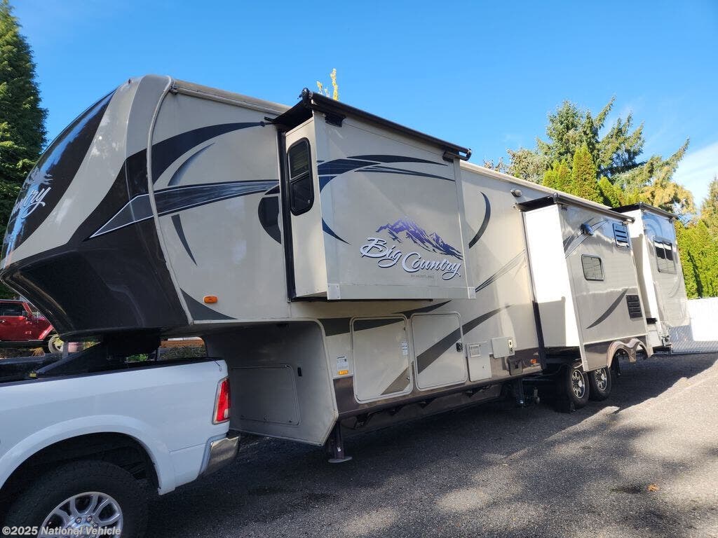 Call now about this 2013 Heartland Big Country 3691SK! 2013 Heartland Big Country 3691SK - Used Fifth Wheel For Sale by National Vehicle in Longview, Washington