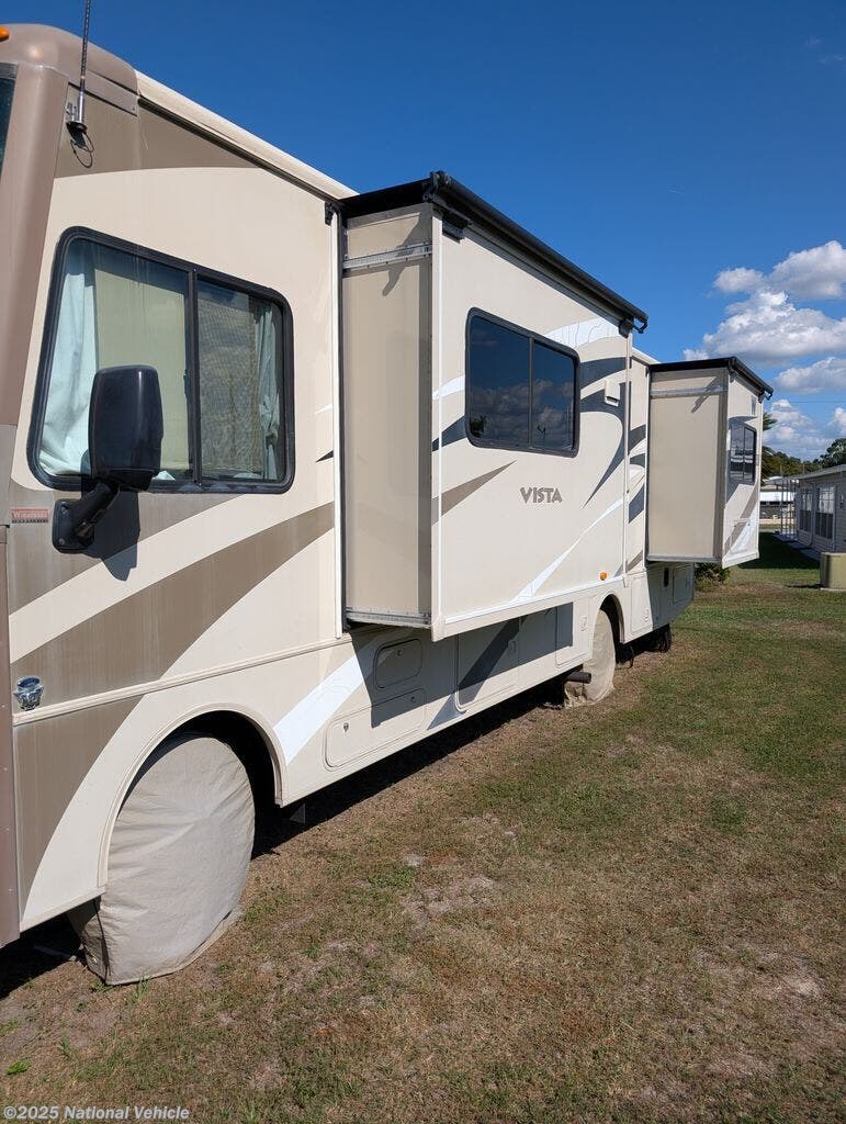 Call now about this 2015 Winnebago Vista 30T! 2015 Winnebago Vista 30T - Used Class A For Sale by National Vehicle in Zephyrhills, Florida