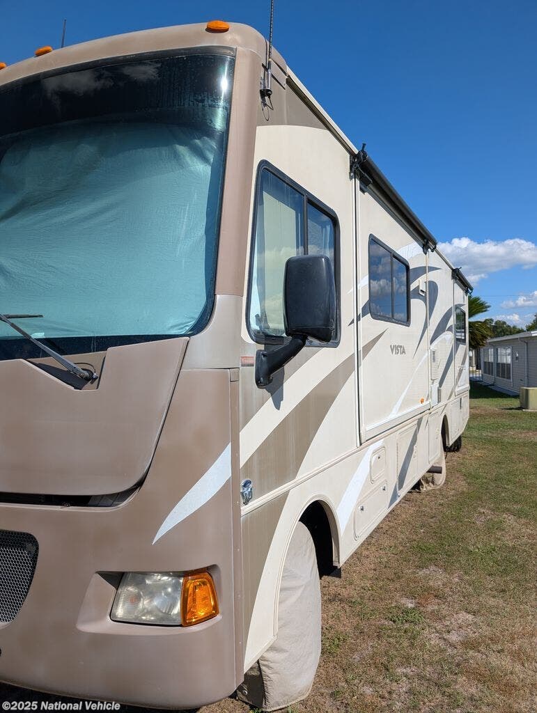 Contact us now about this 2015 Winnebago Vista 30T! 2015 Vista 30T by Winnebago from National Vehicle in Zephyrhills, Florida