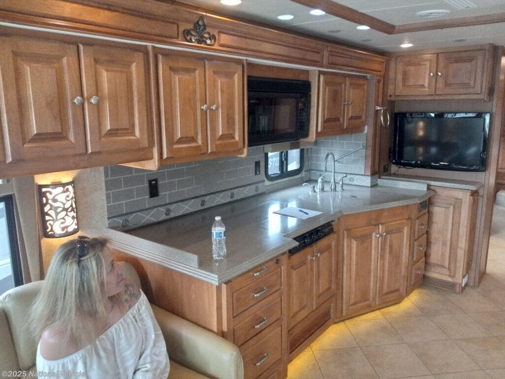 Contact us now about this 2010 Tiffin Phaeton 40QTH! 2010 Phaeton 40QTH by Tiffin from National Vehicle in Kingston, Washington