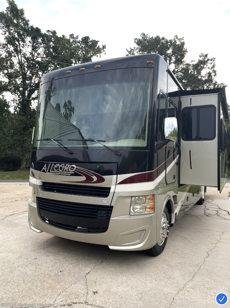 Call now about this 2015 Tiffin Allegro Open Road 35QBA! 2015 Tiffin Allegro Open Road 35QBA - Used Class A For Sale by National Vehicle in Hattiesburg, Mississippi