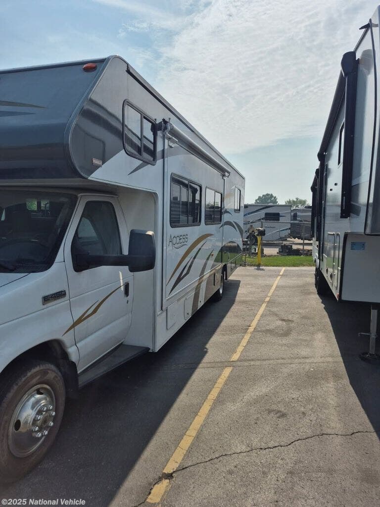 Contact us now about this 2010 Winnebago Access 31C! 2010 Access 31C by Winnebago from National Vehicle in South Gate, Michigan