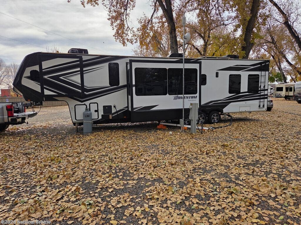 Call now about this 2023 Grand Design Momentum 399TH! 2023 Grand Design Momentum 399TH - Used Fifth Wheel For Sale by National Vehicle in Loveland, Colorado