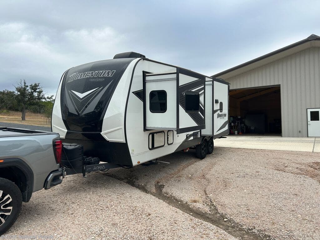Call now about this 2023 Grand Design Momentum G-Class 25G! 2023 Grand Design Momentum G-Class 25G - Used Toy Hauler For Sale by National Vehicle in Kerrville, Texas