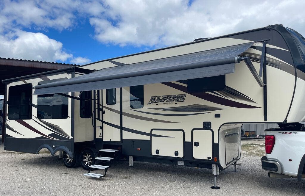 Call now about this 2017 Keystone Alpine 3011RE! 2017 Keystone Alpine 3011RE - Used Fifth Wheel For Sale by National Vehicle in McKinney, Texas