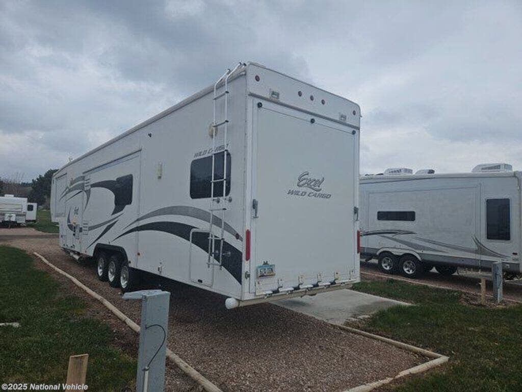 Call now about this 2013 Excel Wild Cargo 41RLE! 2013 Excel Wild Cargo 41RLE - Used Toy Hauler For Sale by National Vehicle in Rapid City, South Dakota