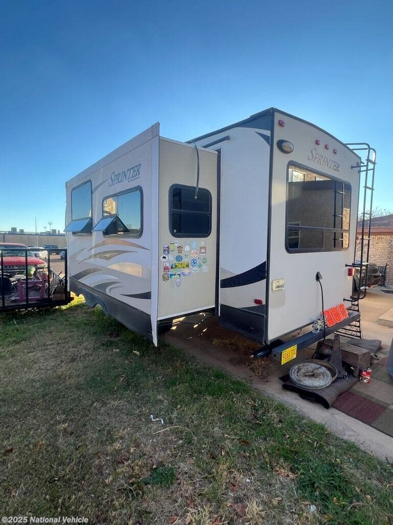 Call now about this 2013 Keystone Sprinter 255RKS! 2013 Keystone Sprinter 255RKS - Used Travel Trailer For Sale by National Vehicle in Clovis, New Mexico