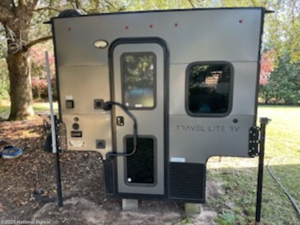 Call now about this 2020 Travel Lite Ultra Lite 625SL! 2020 Travel Lite Ultra Lite 625SL - Used Truck Camper For Sale by National Vehicle in Sumter, South Carolina