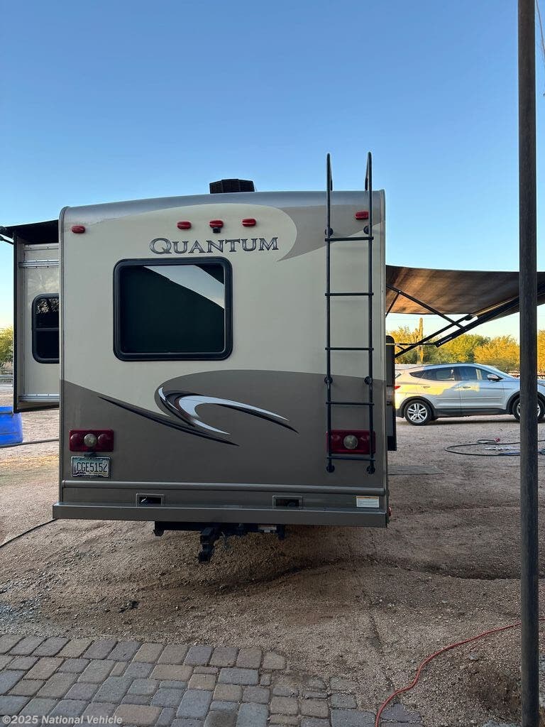 Call now about this 2017 Thor Motor Coach Quantum 29RQ! 2017 Thor Motor Coach Quantum 29RQ - Used Class C For Sale by National Vehicle in Cave Creek, Arizona