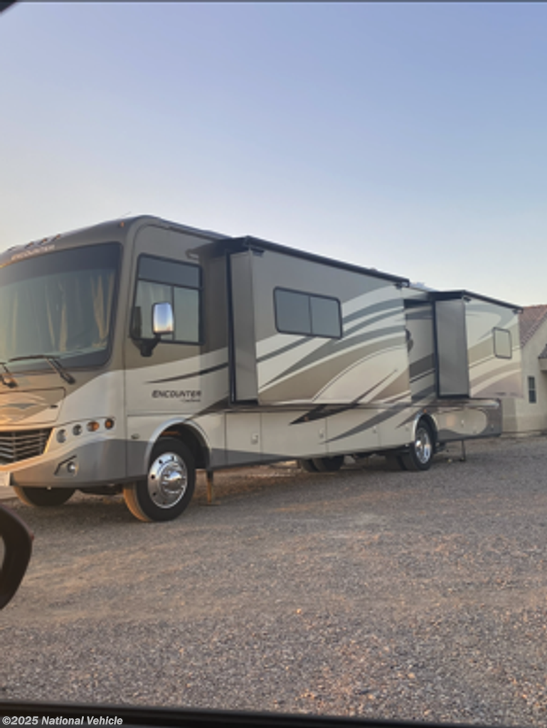Call now about this 2011 Coachmen Encounter 36KS! 2011 Coachmen Encounter 36KS - Used Class A For Sale by National Vehicle in Oneco, Florida