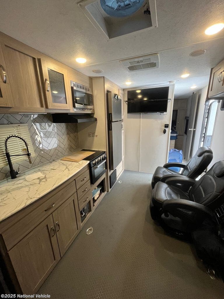 Call now about this 2022 Forest River Work and Play 27LT! 2022 Forest River Work and Play 27LT - Used Toy Hauler For Sale by National Vehicle in Pasadena, Maryland