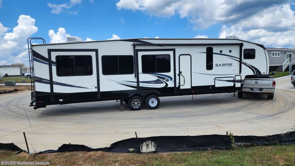 Call now about this 2020 Forest River Sabre 38RDP! 2020 Forest River Sabre 38RDP - Used Fifth Wheel For Sale by National Vehicle in Willis, Texas
