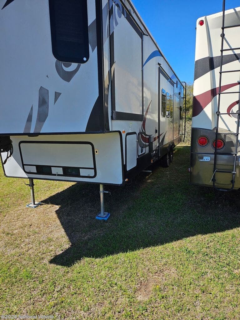 Call now about this 2014 Forest River XLR Viper 305V12! 2014 Forest River XLR Viper 305V12 - Used Toy Hauler For Sale by National Vehicle in Ocala, Florida
