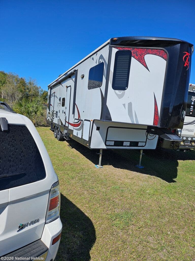Contact us now about this 2014 Forest River XLR Viper 305V12! 2014 XLR Viper 305V12 by Forest River from National Vehicle in Ocala, Florida