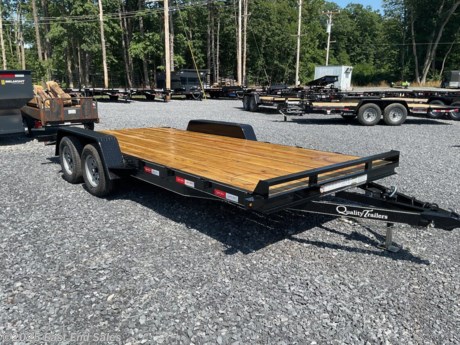 GVWR 7000 lb. – Capacity 6000 lb. with 1000 lb. Hitchload
Must support rear of trailer when loading vehicle over 4,000 lb.
Treated wood deck
Standard 2 ft. dove tail
82? between fenders
3500 lb. braking axles with 4 wheel brakes
Double eye spring suspension
205/75 R15 load range C 6 ply rating Castle Rock Radial tires
5? channel frame
3? channel cross members – 24? spacing
4? channel wrap-around tongue
5 ft. rear slide-in ladder-style ramps
2 5/16? A-frame coupler
Swing-up jack
Diamond plate fenders with backs
Steps in front and behind fenders
Stake pockets, self charging break away kit, safety chains, skip DOT reflective tape and all rubber mounted sealed beam lighting with conventional wiring with gel filled connectors
Primed, 2 coats of acrylic enamel, pin striped
These are cash prices    
3% charge on card transactions