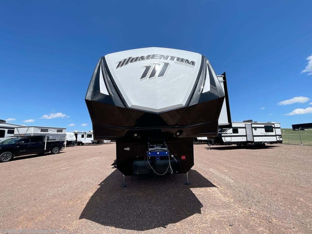 Call now about this 2026 Grand Design Momentum M-Class 414M! 2026 Grand Design Momentum M-Class 414M - New Toy Hauler For Sale by Blue Compass RV Tyler in Tyler, Texas features Slideout