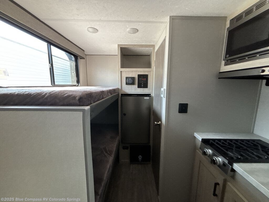 Contact us now about this 2025 Forest River Aurora Light 13BHX! 2025 Aurora Light 13BHX by Forest River from Blue Compass RV Colorado Springs in Colorado Springs, Colorado
