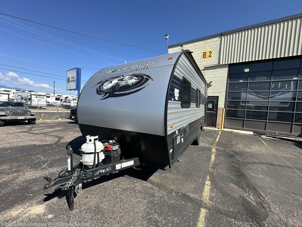 Call now about this 2022 Forest River Cherokee Wolf Pup 16BHS! 2022 Forest River Cherokee Wolf Pup 16BHS - Used Travel Trailer For Sale by Blue Compass RV Colorado Springs in Colorado Springs, Colorado