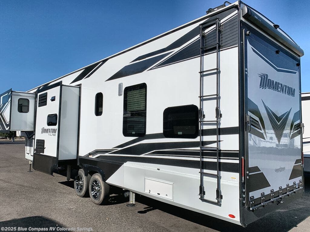 Call now about this 2023 Grand Design Momentum M-Class 351MS! 2023 Grand Design Momentum M-Class 351MS - Used Toy Hauler For Sale by Blue Compass RV Colorado Springs in Colorado Springs, Colorado