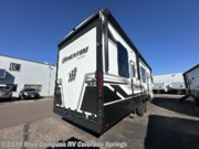 Call now about this 2026 Grand Design Momentum G-Class 320G! 2026 Grand Design Momentum G-Class 320G - New Toy Hauler For Sale by Blue Compass RV Colorado Springs in Colorado Springs, Colorado