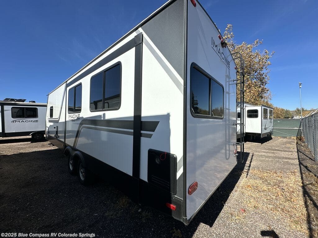 Call now about this 2025 Grand Design Imagine 2670MK! 2025 Grand Design Imagine 2670MK - New Travel Trailer For Sale by Blue Compass RV Colorado Springs in Colorado Springs, Colorado features Slideout