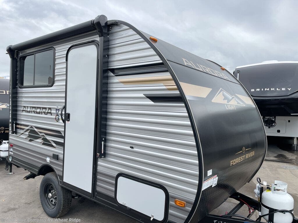 Contact us now about this 2026 Forest River Aurora Light 13BHX! 2026 Aurora Light 13BHX by Forest River from Blue Compass RV Wheat Ridge in Wheat Ridge, Colorado