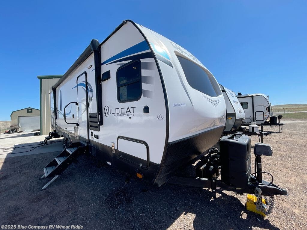 Call now about this 2022 Forest River Wildcat 276FKX! 2022 Forest River Wildcat 276FKX - Used Travel Trailer For Sale by Blue Compass RV Wheat Ridge in Wheat Ridge, Colorado features Slideout