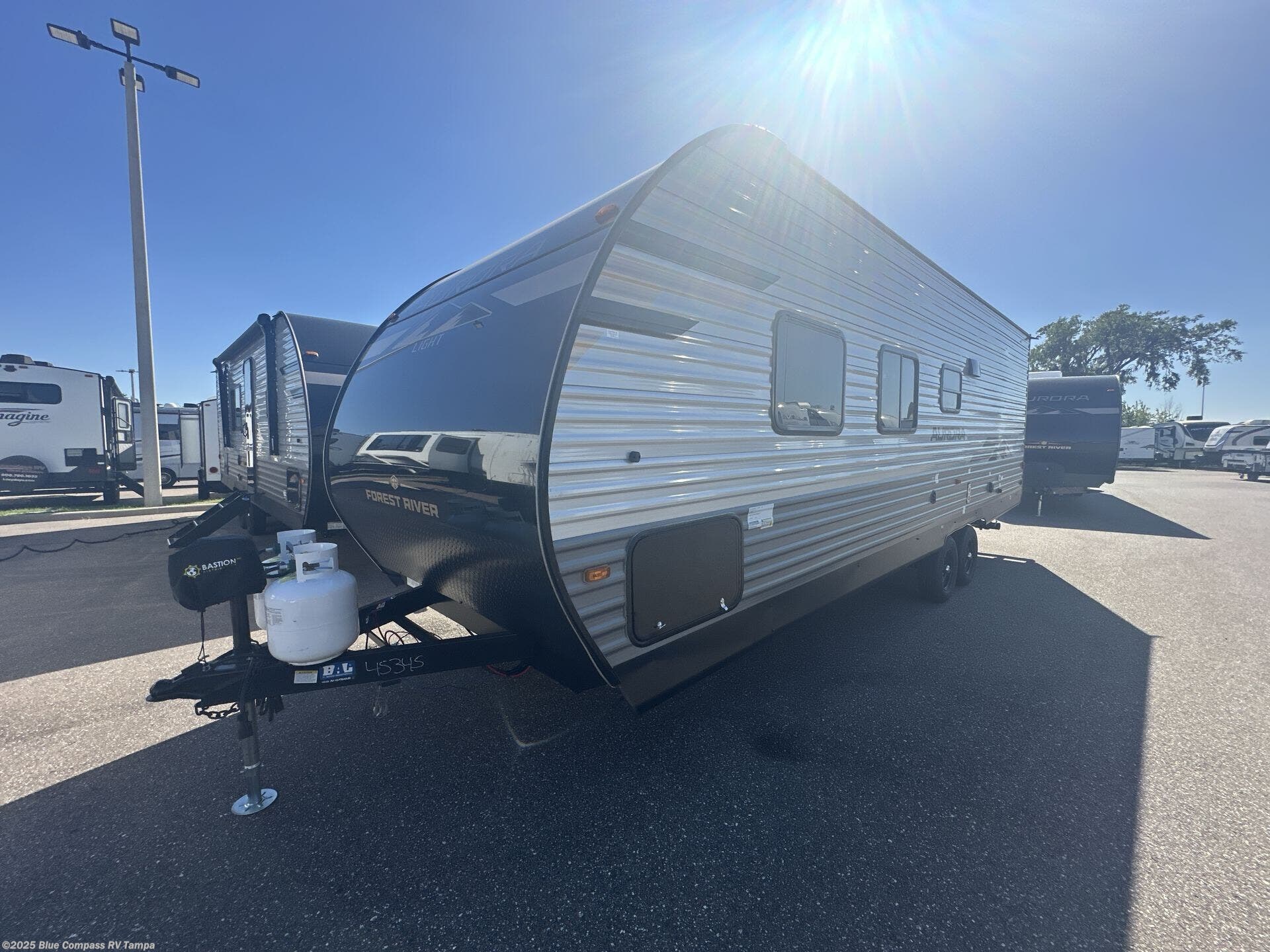 Contact us now about this 2025 Forest River Aurora Light 26BH! 2025 Aurora Light 26BH by Forest River from Blue Compass RV Tampa in Dover, Florida