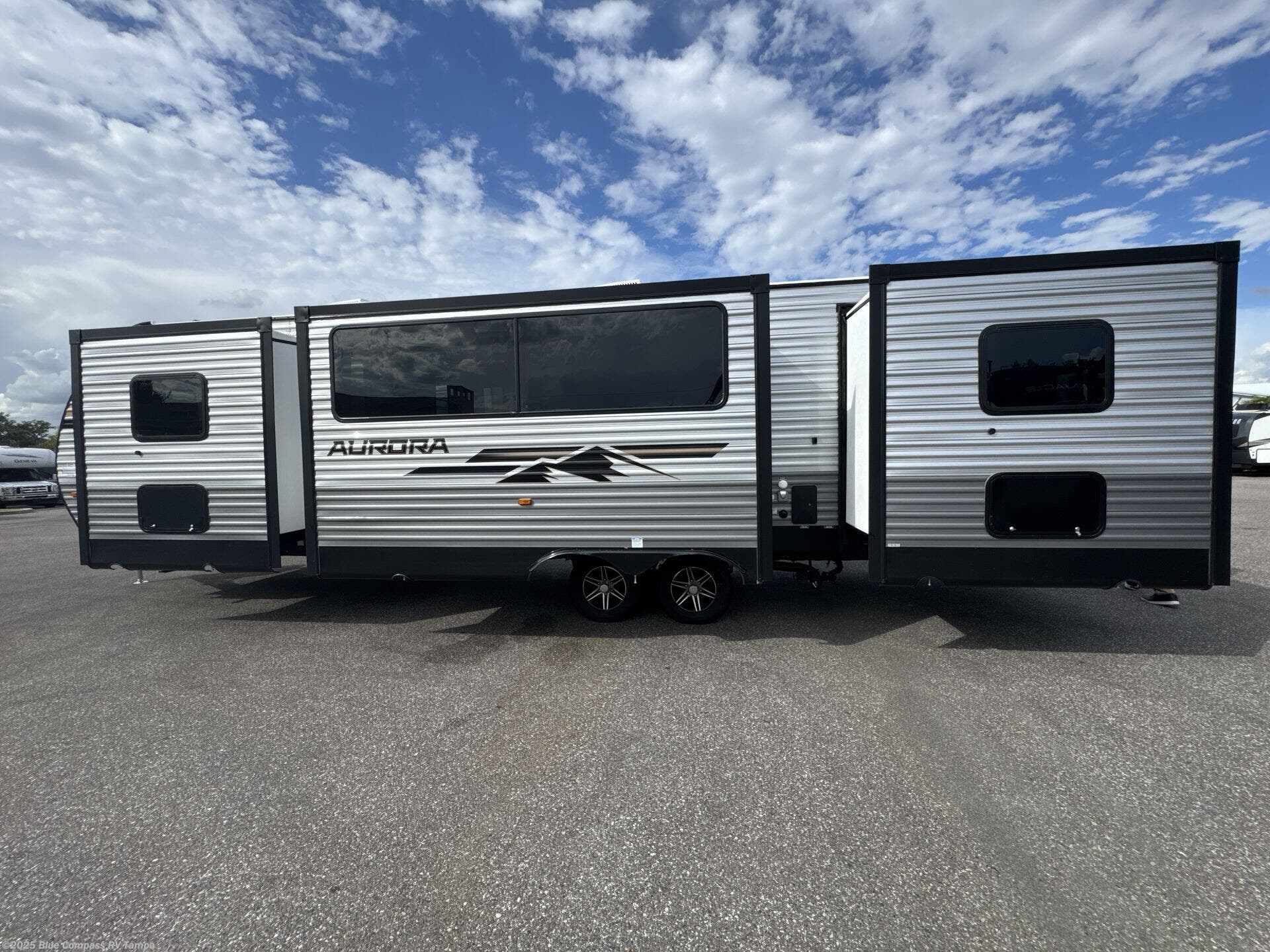 Contact us now about this 2026 Forest River Aurora 34BHTS (2 Queen Beds)! 2026 Aurora 34BHTS (2 Queen Beds) by Forest River from Blue Compass RV Tampa in Dover, Florida