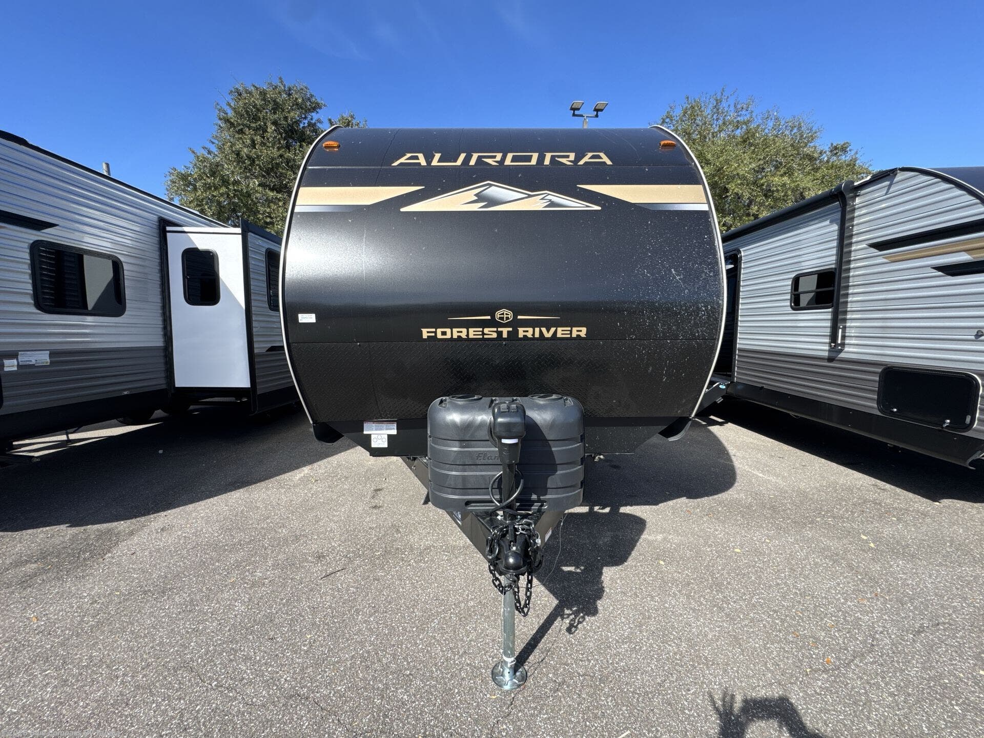 Contact us now about this 2026 Forest River Aurora 29TQS! 2026 Aurora 29TQS by Forest River from Blue Compass RV Tampa in Dover, Florida