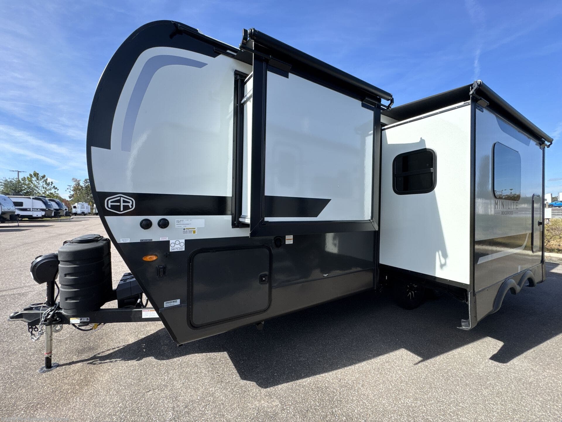 Call now about this 2026 Forest River Rockwood Mini Lite 2511S! 2026 Forest River Rockwood Mini Lite 2511S - New Travel Trailer For Sale by Blue Compass RV Tampa in Dover, Florida