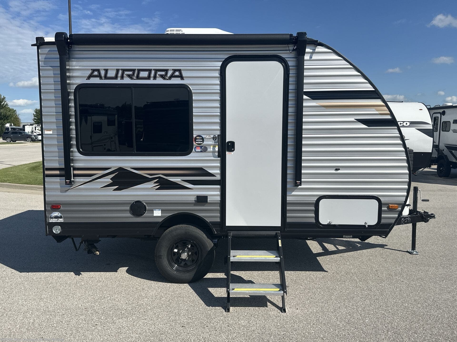Contact us now about this 2026 Forest River Aurora Light 13RDX! 2026 Aurora Light 13RDX by Forest River from Blue Compass RV Des Moines in Altoona, Iowa