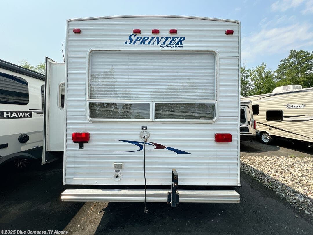 Call now about this 2002 Keystone Sprinter 262RLS! 2002 Keystone Sprinter 262RLS - Used Travel Trailer For Sale by Blue Compass RV Albany in Latham, New York