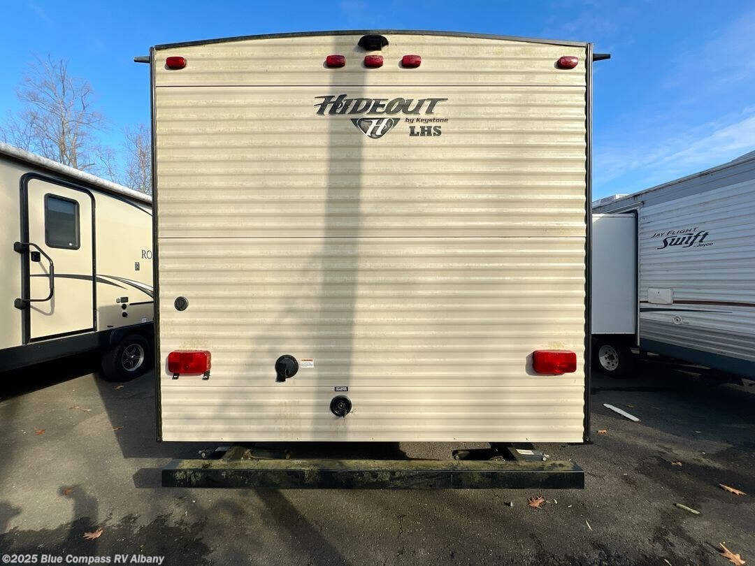 Contact us now about this 2018 Keystone Hideout 272LHS! 2018 Hideout 272LHS by Keystone from Blue Compass RV Albany in Latham, New York