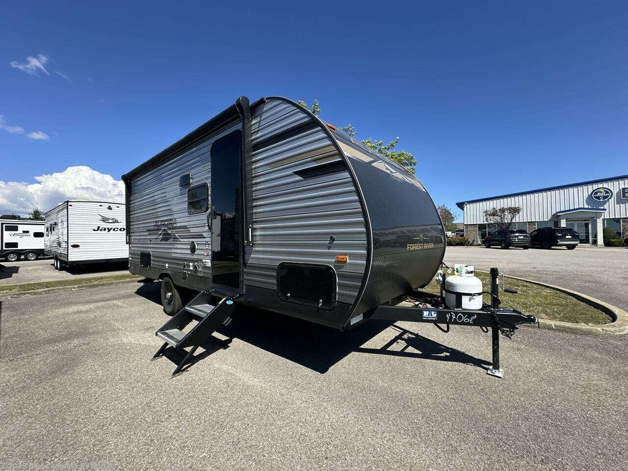 Contact us now about this 2026 Forest River Aurora Light 18BHS! 2026 Aurora Light 18BHS by Forest River from Blue Compass RV Buffalo in West Seneca, New York