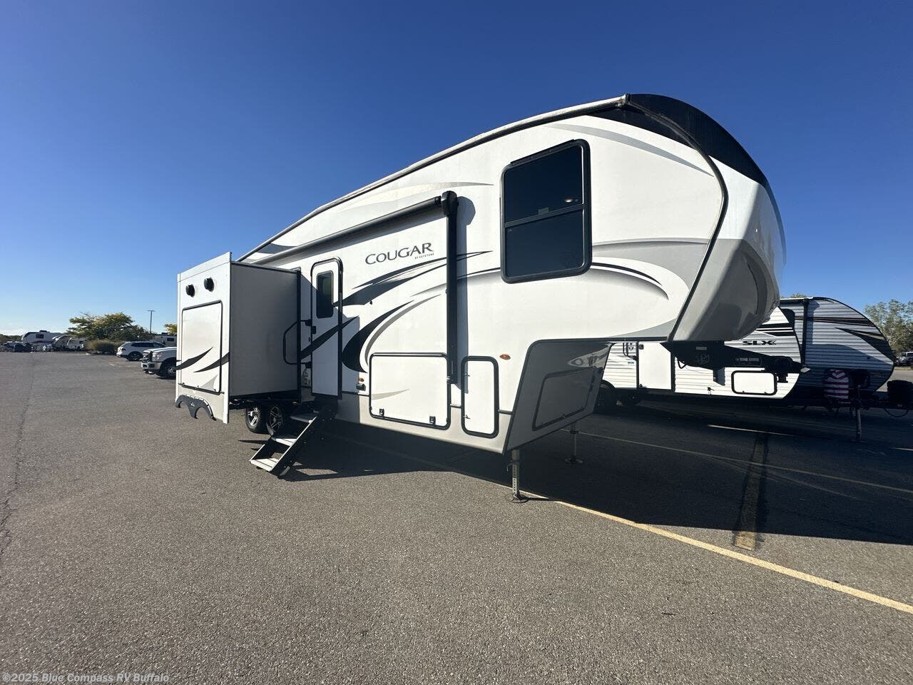 Contact us now about this 2022 Keystone Cougar Half-Ton 29RKS! 2022 Cougar Half-Ton 29RKS by Keystone from Blue Compass RV Buffalo in West Seneca, New York