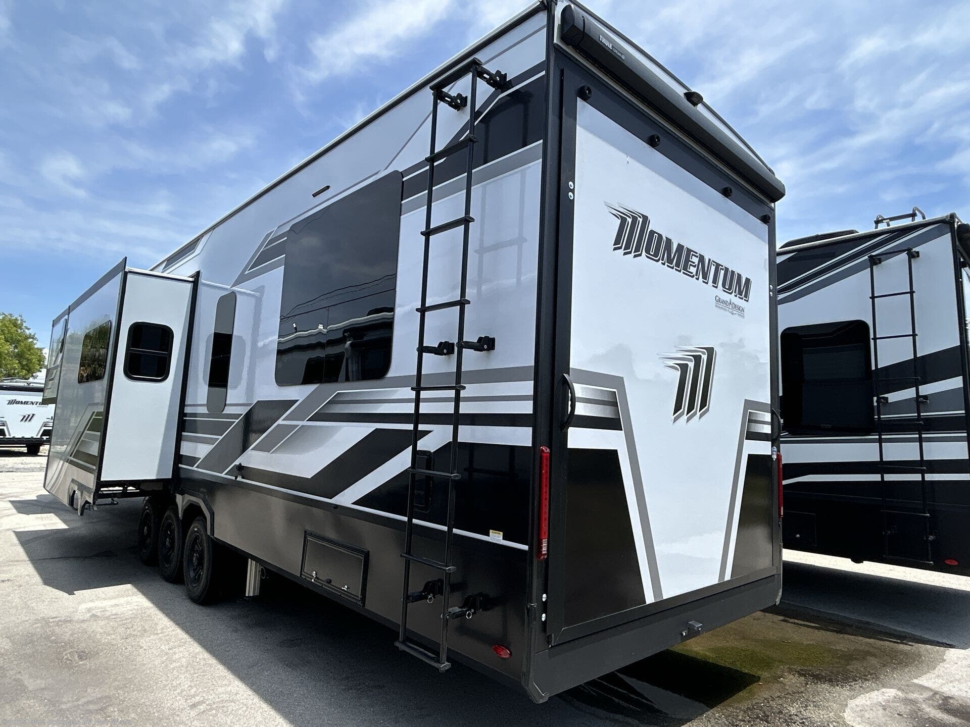 Call now about this 2025 Grand Design Momentum M-Class 395MS! 2025 Grand Design Momentum M-Class 395MS - New Fifth Wheel For Sale by Blue Compass RV Fort Myers in Fort Myers, Florida