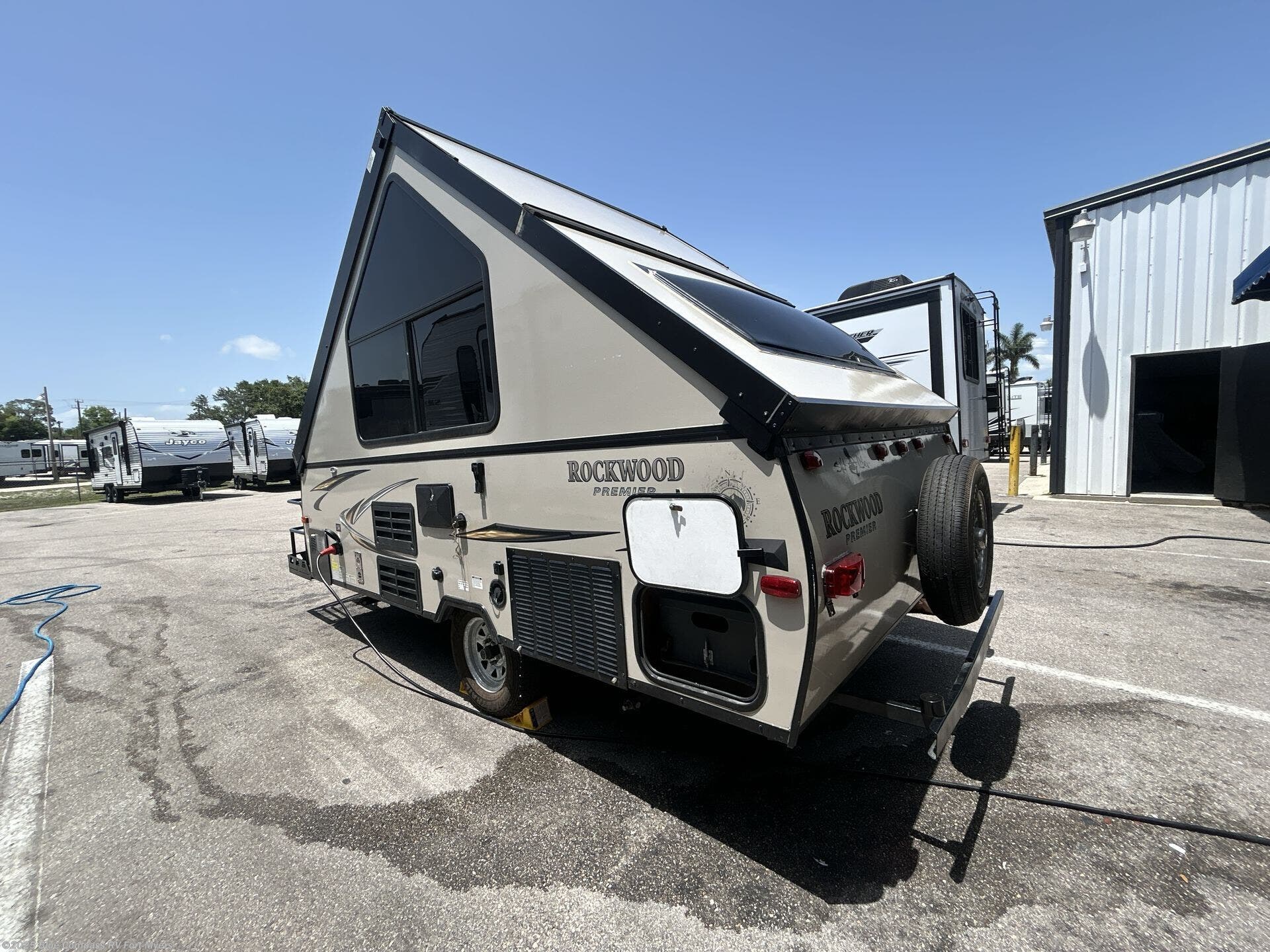 Contact us now about this 2014 Forest River Rockwood Hard Side Series A122BH! 2014 Rockwood Hard Side Series A122BH by Forest River from Blue Compass RV Fort Myers in Fort Myers, Florida