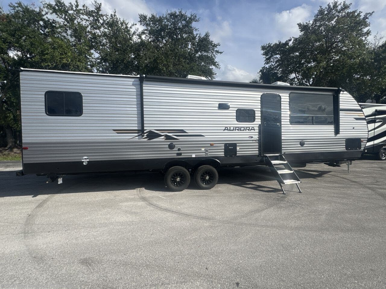 Contact us now about this 2026 Forest River Aurora 34BHTS (2 Queen Beds)! 2026 Aurora 34BHTS (2 Queen Beds) by Forest River from Blue Compass RV Orlando in Casselberry, Florida