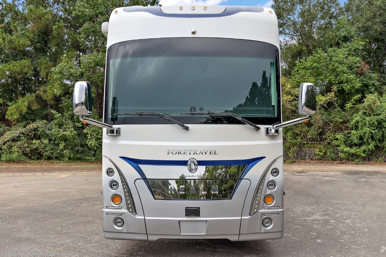 Call now about this 2026 Foretravel Realm Presidential Series lV7! 2026 Foretravel Realm Presidential Series lV7 - New Class A For Sale by Blue Compass RV Orlando in Casselberry, Florida