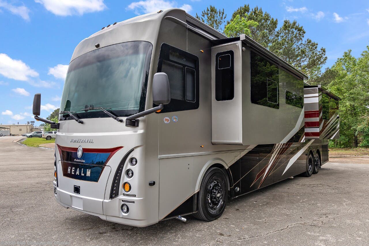 Contact us now about this 2026 Foretravel Realm FS605 LV1! 2026 Realm FS605 LV1 by Foretravel from Blue Compass RV Orlando in Casselberry, Florida
