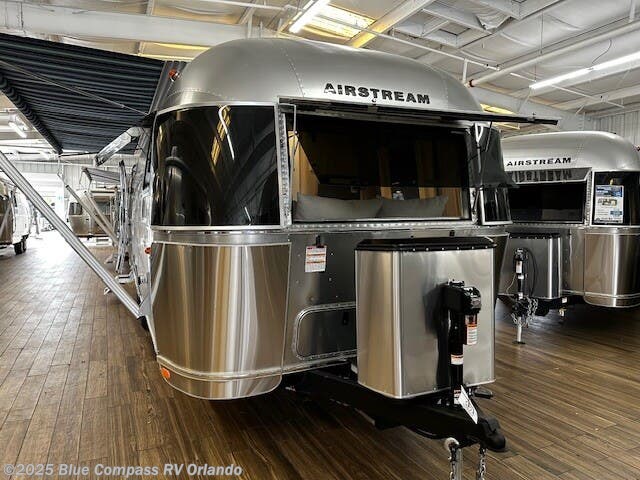 Call now about this 2025 Airstream International 27FBQ! 2025 Airstream International 27FBQ - New Travel Trailer For Sale by Blue Compass RV Orlando in Casselberry, Florida