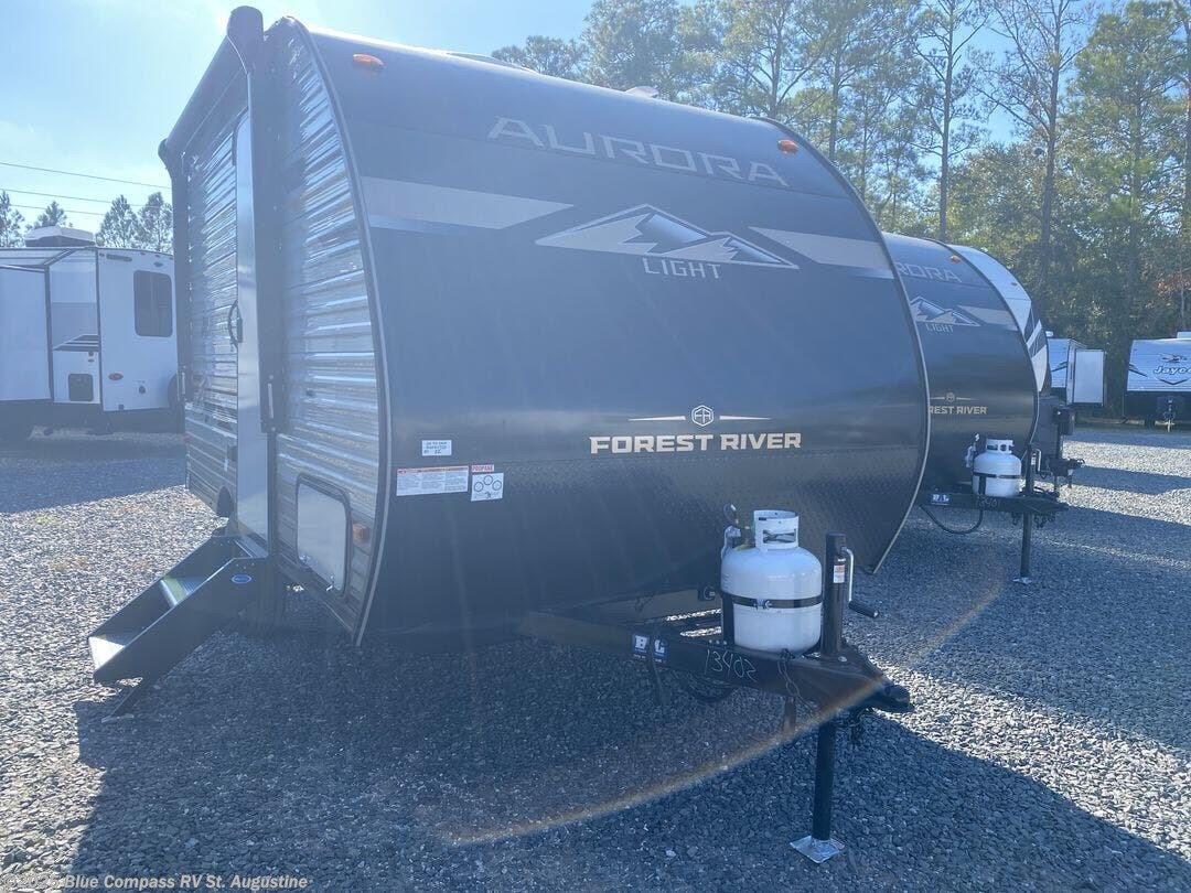 Contact us now about this 2026 Forest River Aurora Light 13RKX! 2026 Aurora Light 13RKX by Forest River from Blue Compass RV St. Augustine in St. Augustine, Florida