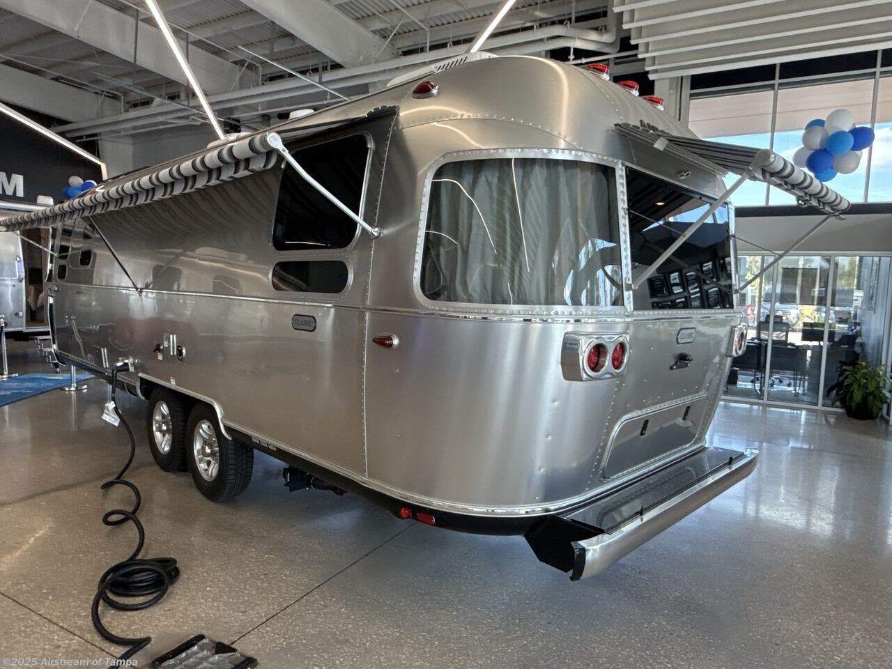 Call now about this 2026 Airstream Classic 28RBQ! 2026 Airstream Classic 28RBQ - New Travel Trailer For Sale by Airstream of Tampa in Dover, Florida