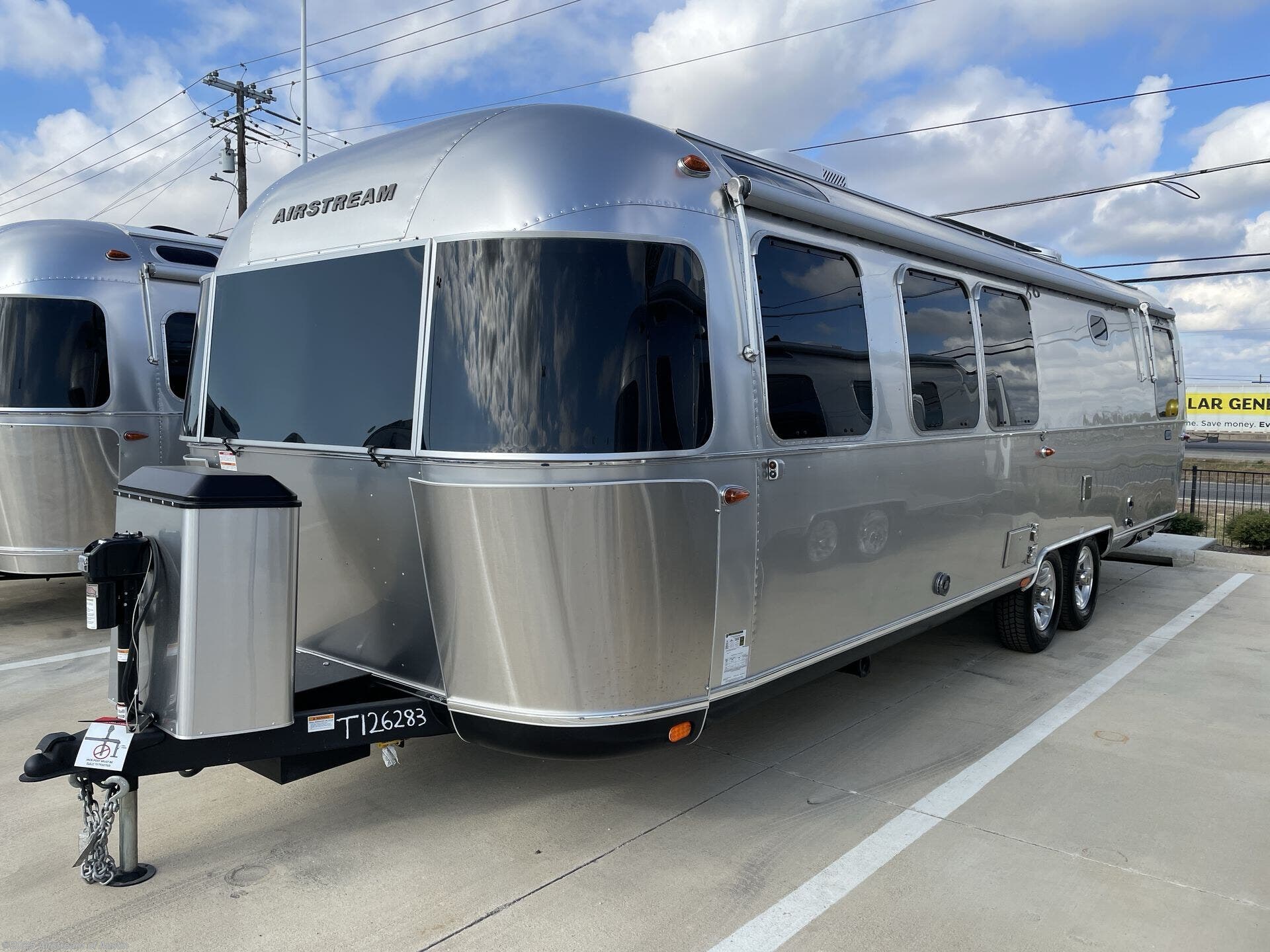 Call now about this 2026 Airstream Classic 30RB Queen! 2026 Airstream Classic 30RB Queen - New Travel Trailer For Sale by Airstream of Austin in Buda, Texas