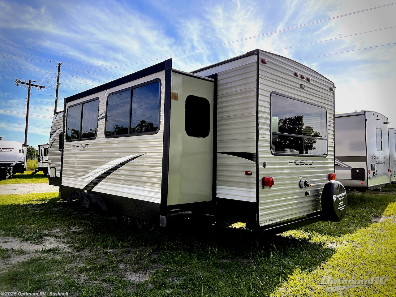Call now about this 2019 Keystone Hideout 26RLS! 2019 Keystone Hideout 26RLS - Used Travel Trailer For Sale by Optimum RV - Bushnell in Bushnell, Florida features Slideout, Awning