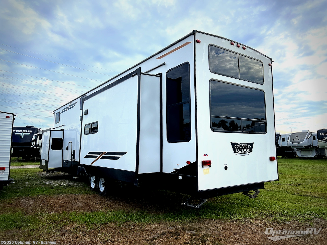 Call now about this 2022 Forest River Wildwood Grand Lodge 42DL! 2022 Forest River Wildwood Grand Lodge 42DL - Used Destination Trailer For Sale by Optimum RV - Bushnell in Bushnell, Florida features Awning, Slideout
