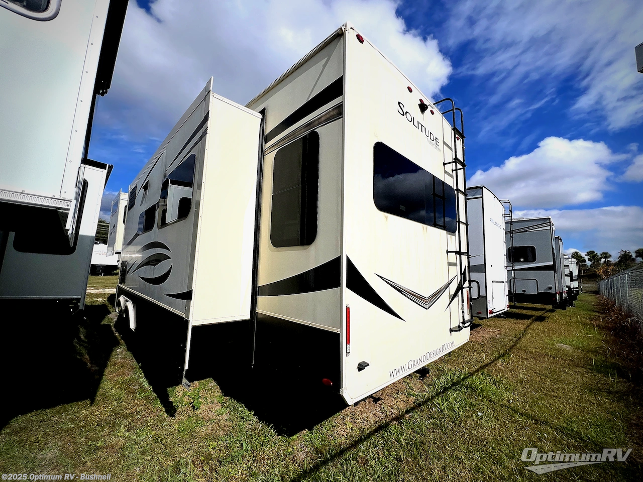 Call now about this 2021 Grand Design Solitude 373FB! 2021 Grand Design Solitude 373FB - Used Fifth Wheel For Sale by Optimum RV - Bushnell in Bushnell, Florida features Awning, Slideout