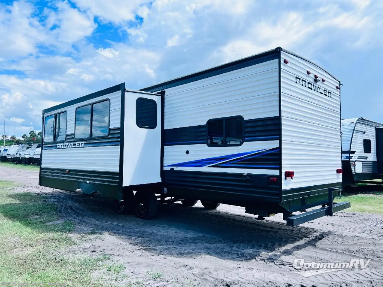 Call now about this 2021 Heartland Prowler 300BH! 2021 Heartland Prowler 300BH - Used Travel Trailer For Sale by Optimum RV - Bushnell in Bushnell, Florida features Slideout, Awning
